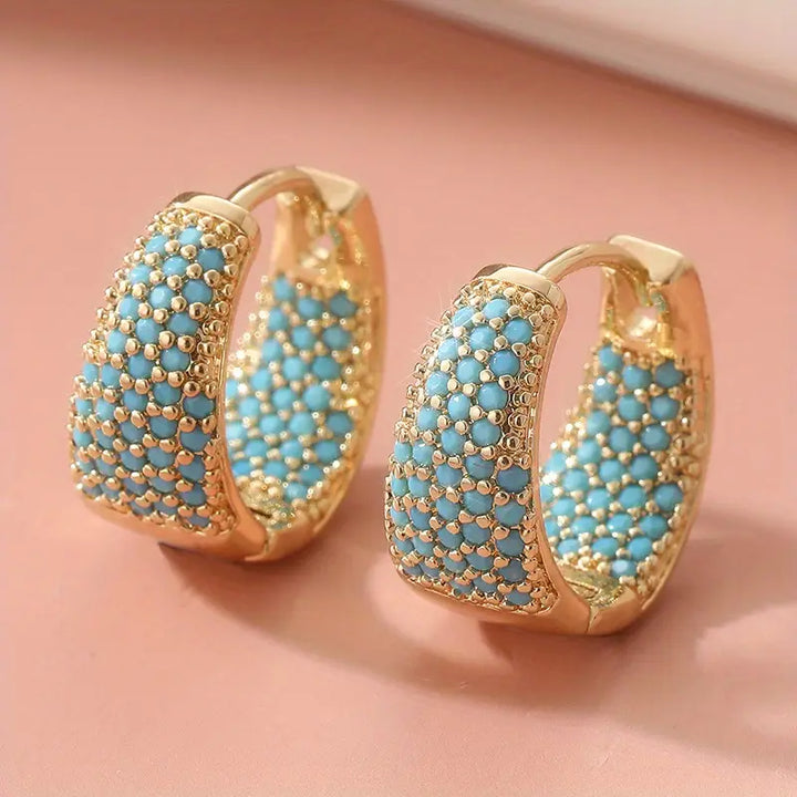 Orecchini a cerchio con perline turchesi color oro | Oro