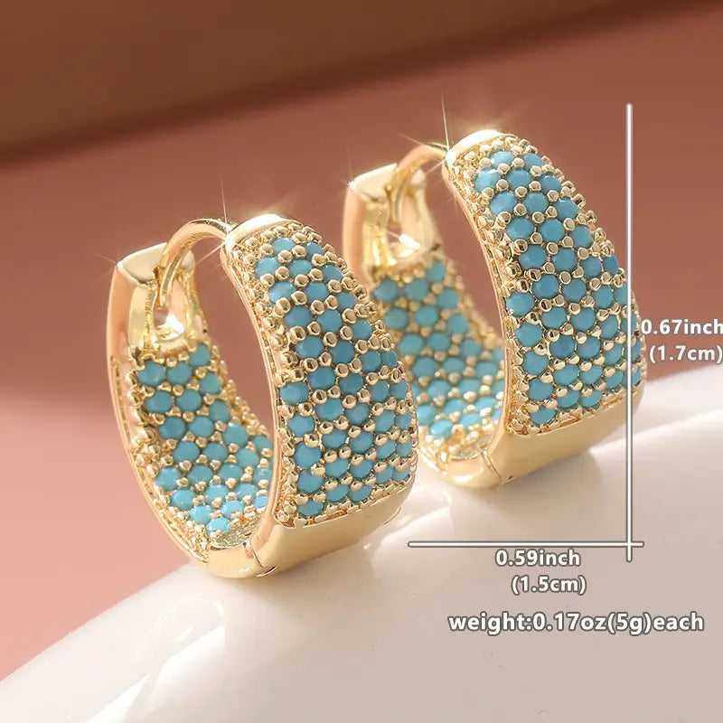 Orecchini a cerchio con perline turchesi color oro | Oro
