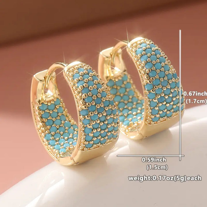 Orecchini a cerchio con perline turchesi color oro | Oro