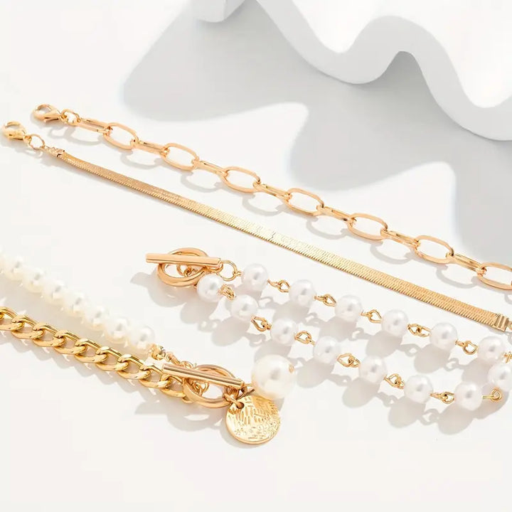 Set di 4 bracciali Chic Gold – Serpente, perle e maglie | Oro