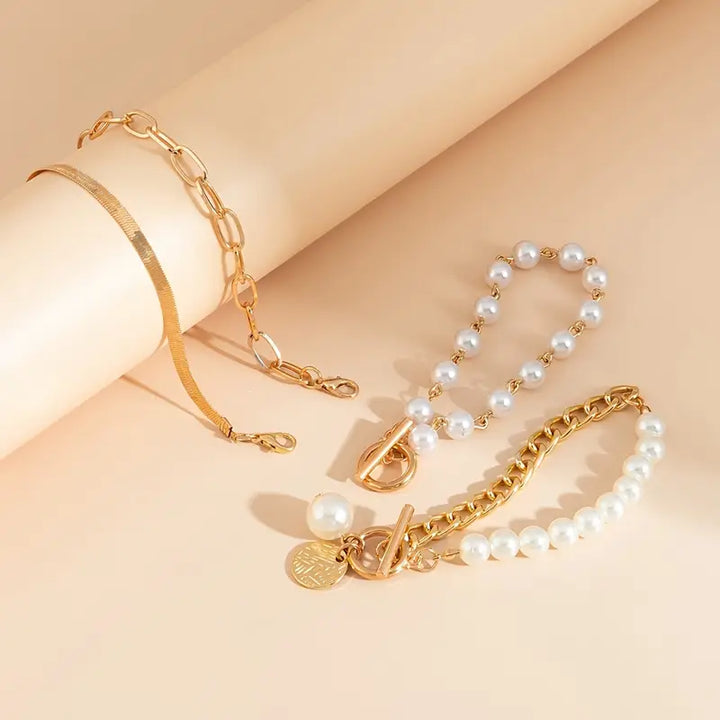 Set di 4 bracciali Chic Gold – Serpente, perle e maglie | Oro